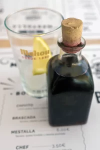 Small glass bottle of wine